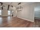 Dining room with hardwood floors and a large chandelier at 4020 Landsford Rd, Marshville, NC 28103