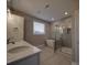 Main bathroom with double vanity, soaking tub, and shower at 4020 Landsford Rd, Marshville, NC 28103