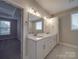 Bathroom with double vanity and granite countertop at 4020 Landsford Rd, Marshville, NC 28103
