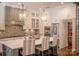 Modern kitchen with white and gray cabinets and large pantry at 182 Shagbark Ct, Mount Gilead, NC 27306