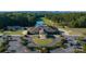 Aerial view of clubhouse with parking and landscaping at 182 Shagbark Ct, Mount Gilead, NC 27306