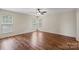 Spacious bedroom featuring hardwood floors and large windows at 1900 Mt Isle Harbor Dr, Charlotte, NC 28214