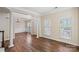 Living room with hardwood floors, natural light, and neutral colors at 1900 Mt Isle Harbor Dr, Charlotte, NC 28214