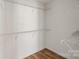 Large walk-in closet with wire shelving at 1900 Mt Isle Harbor Dr, Charlotte, NC 28214