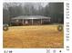 Brick ranch house on a large lot at 12608 Rocky River Church Rd, Charlotte, NC 28215