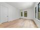 Bright bedroom with hardwood floors and access to a deck at 2112 Kirkwood Ave, Charlotte, NC 28203