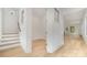 Bright hallway with light hardwood floors and staircase at 2112 Kirkwood Ave, Charlotte, NC 28203