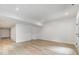 Spacious finished basement with hardwood floors and recessed lighting at 2112 Kirkwood Ave, Charlotte, NC 28203