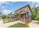 Two-story brick home with gray accents and landscaped yard at 2112 Kirkwood Ave, Charlotte, NC 28203