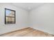 Bright bedroom with hardwood floors and a window at 2112 Kirkwood Ave, Charlotte, NC 28203