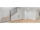 Modern staircase with wood steps and metal railing at 2112 Kirkwood Ave, Charlotte, NC 28203