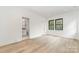 Bedroom with hardwood floors and ensuite bathroom at 2112 Kirkwood Ave, Charlotte, NC 28203