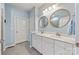 Bathroom boasts double vanity and large mirrors at 160 Beacon Dr # D, Mooresville, NC 28117