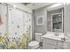 Basement bathroom with a shower/tub combo and updated vanity at 160 Beacon Dr # D, Mooresville, NC 28117