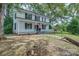 Two-story house with a covered porch and landscaping at 35 E Catawba St, Belmont, NC 28012