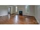 Bright living room with hardwood floors and fireplace at 35 E Catawba St, Belmont, NC 28012