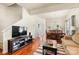 Spacious living area with hardwood floors, dining area, and ample natural light at 7171 April Mist Trl, Huntersville, NC 28078