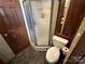 Bathroom with a toilet, shower, and vanity at 113 Hummingbird Cir, New London, NC 28127