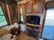 Living area with fireplace, TV and ample seating at 113 Hummingbird Cir, New London, NC 28127