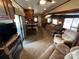 Spacious living area with comfortable seating and a TV at 113 Hummingbird Cir, New London, NC 28127