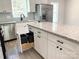 Kitchen island with built-in trash and recycling bins at 2871 Brendale Dr, Lancaster, SC 29720