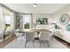 Bright dining room featuring a large table and modern decor at 211 Coronado Ave # 57, Matthews, NC 28104