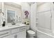 Clean bathroom with shower/tub combo and white vanity at 211 Coronado Ave # 57, Matthews, NC 28104