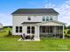 Spacious backyard with patio, fire pit and screened porch at 211 Coronado Ave # 57, Matthews, NC 28104