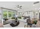 Open living room with a view into the kitchen area at 211 Coronado Ave # 57, Matthews, NC 28104