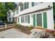 Townhouse with green shutters and a small front yard at 2876 Hosta Dr, Charlotte, NC 28269