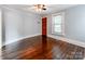 Spacious living room with hardwood floors and ceiling fan at 1501 Cleveland Ave # B, Charlotte, NC 28203