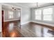 Bright dining room features hardwood floors, large windows, and a chandelier at 1501 Cleveland Ave # B, Charlotte, NC 28203