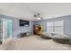 Game room with large TV, bean bag chairs, and arcade game at 133 Lassen Ln, Mooresville, NC 28117