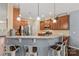 Modern kitchen with stainless steel appliances and a breakfast bar at 133 Lassen Ln, Mooresville, NC 28117