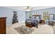 Bright bedroom with a queen-size bed and wooden dresser at 133 Lassen Ln, Mooresville, NC 28117