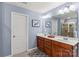 Elegant bathroom with double vanity, large mirror, and shower at 133 Lassen Ln, Mooresville, NC 28117