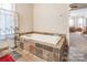 Relaxing bathroom with soaking tub and slate tile flooring at 121 W End St, Chester, SC 29706