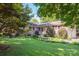 Brick ranch house with a spacious lawn and mature trees at 1890 Rhyneland Rd, Lincolnton, NC 28092