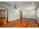 Spacious dining room with hardwood floors and a chandelier at 1890 Rhyneland Rd, Lincolnton, NC 28092