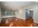 Dining room features hardwood floors and built-in cabinetry at 1890 Rhyneland Rd, Lincolnton, NC 28092