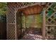 Relaxing gazebo with a wooden swing at 1890 Rhyneland Rd, Lincolnton, NC 28092
