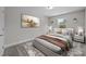 Bright bedroom with a comfortable bed and large window at 103 Dublin Ct, Statesville, NC 28677