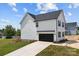 Two-story home with attached garage and driveway at 103 Dublin Ct, Statesville, NC 28677
