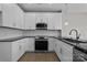 Modern kitchen with white cabinets and granite countertops at 103 Dublin Ct, Statesville, NC 28677