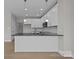 Modern kitchen with white cabinets and granite countertops at 103 Dublin Ct, Statesville, NC 28677