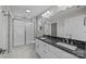 Bathroom with double vanity, shower, and tile floor at 103 Dublin Ct, Statesville, NC 28677