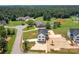 Aerial view of a new home development with various house styles and lots at 103 Dublin Ct, Statesville, NC 28677