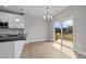 Kitchen nook with access to backyard patio at 103 Dublin Ct, Statesville, NC 28677
