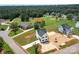 An aerial shot showcasing a neighborhood with houses and green spaces at 103 Dublin Ct, Statesville, NC 28677