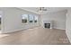 Bright living room with fireplace and hardwood floors at 103 Dublin Ct, Statesville, NC 28677